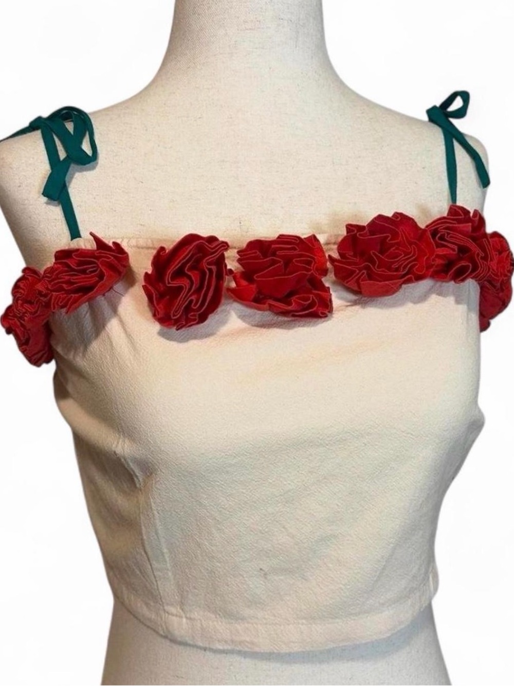 Samantha Pleet Cream Crop Top with Red Rosette Trim and Green Tie Straps